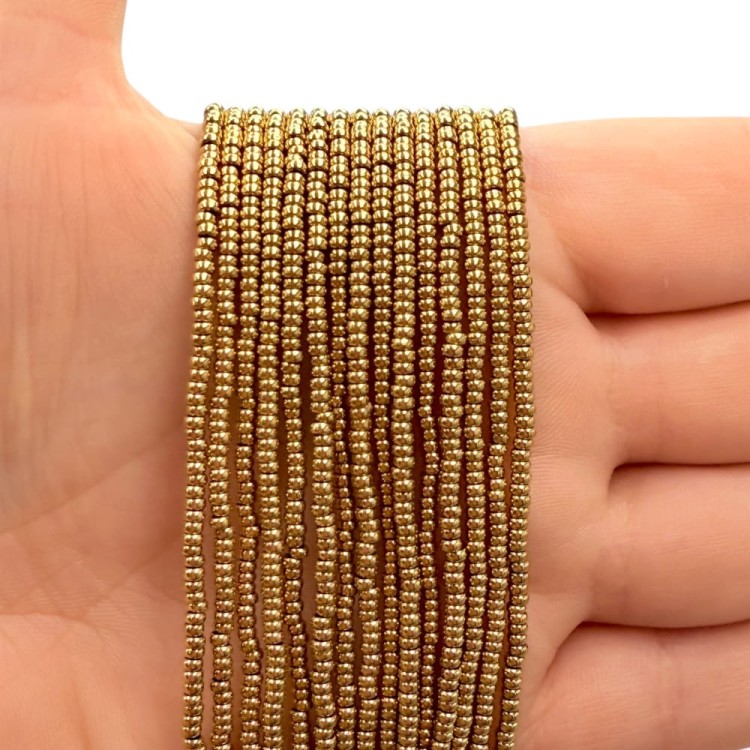 Hematyt Oponka Gładka / kolor ciepłe złoto / ok. 2x1mm