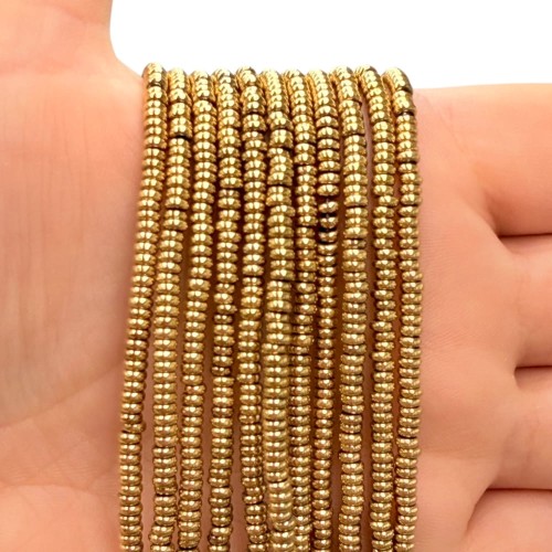 Hematyt Oponka Gładka / kolor ciepłe złoto / ok. 3x1mm