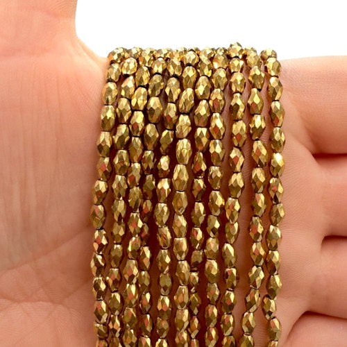 Hematyt Ryż Fasetowany / kolor ciepłe złoto / ok. 3x5mm