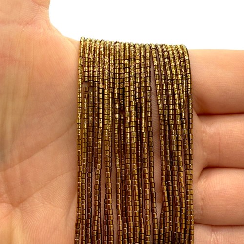 Hematyt Walec / kolor ciemny złoty / ok. 1x1mm