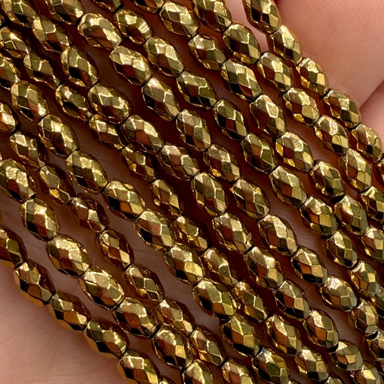 Hematyt ryż fasetowany / kolor ciepłe złoto /ok. 4x6mm