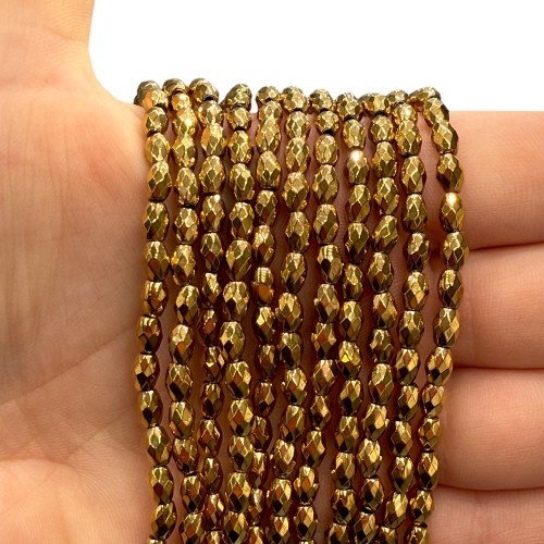 Hematyt ryż fasetowany / kolor ciepłe złoto /ok. 4x6mm