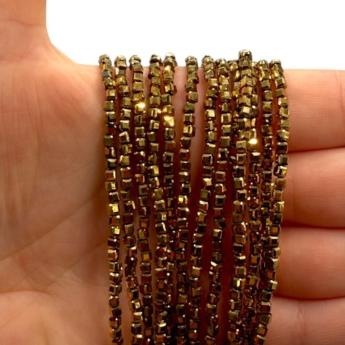 Hematyt Kostka / kolor ciepłe złoto / ok. 2,5x2,5mm