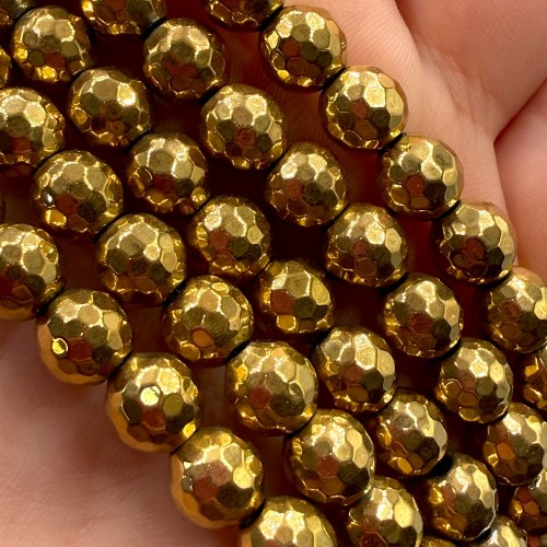 Hematyt kulka fasetowana / kolor ciepłe złoto / ok. 8mm