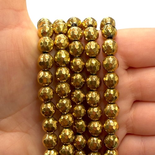 Hematyt kulka fasetowana / kolor ciepłe złoto / ok. 8mm