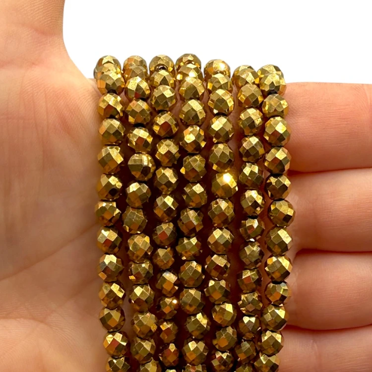 Hematyt kulka fasetowana / kolor ciepłe złoto / ok. 6mm