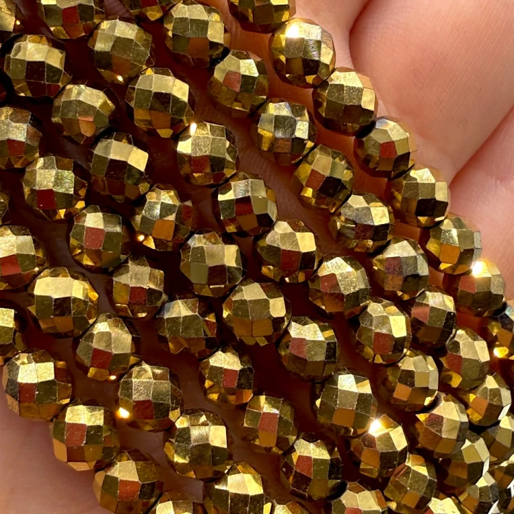 Hematyt kulka fasetowana / kolor ciepłe złoto / ok. 6mm