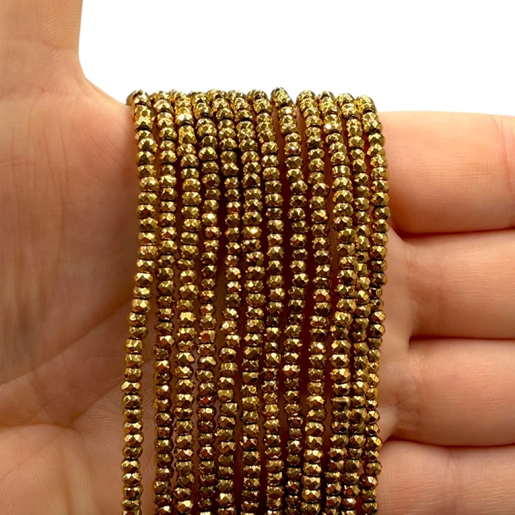 Hematyt Oponka Fasetowana / kolor ciepłe złoto / ok. 3x2mm
