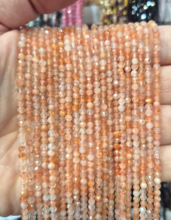 Kamień Słoneczny Ciemny / kulka fasetowana / ok. 3mm