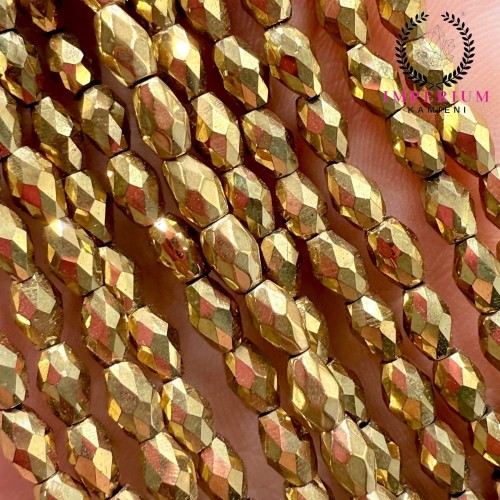 Hematyt ryż fasetowany / kolor ciepły złoty / ok. 3x5 mm